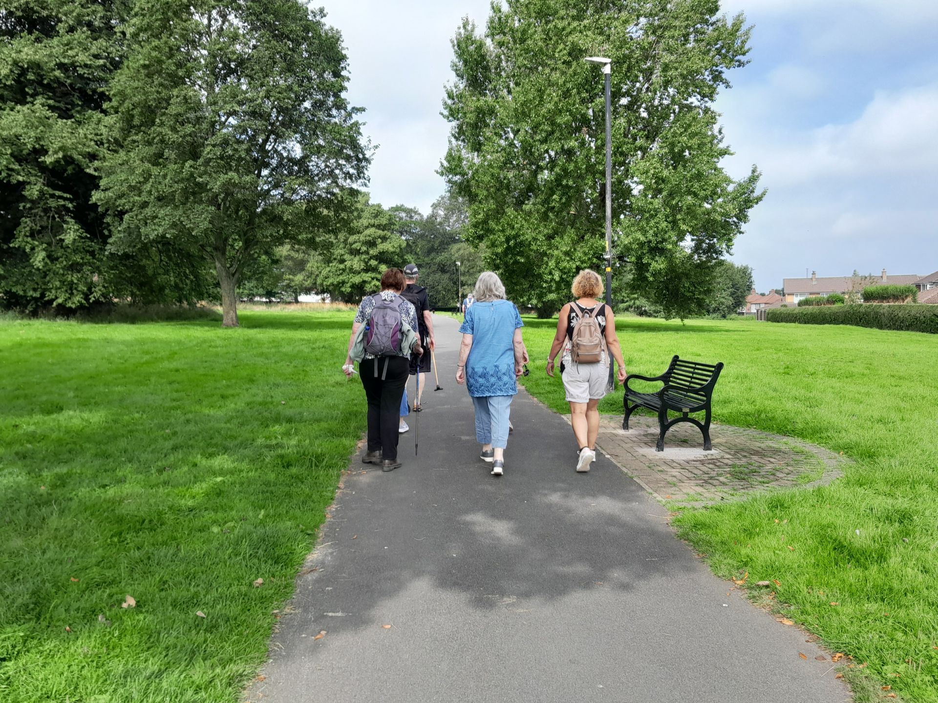 Group walking in Chances Park